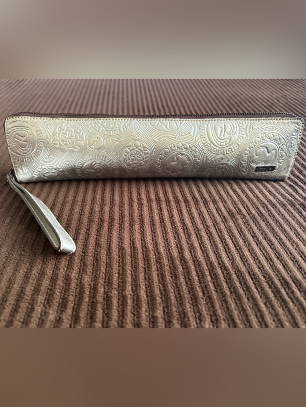 Tous Metallic Silver Embossed Leather Clutch Wristlet Handbag.